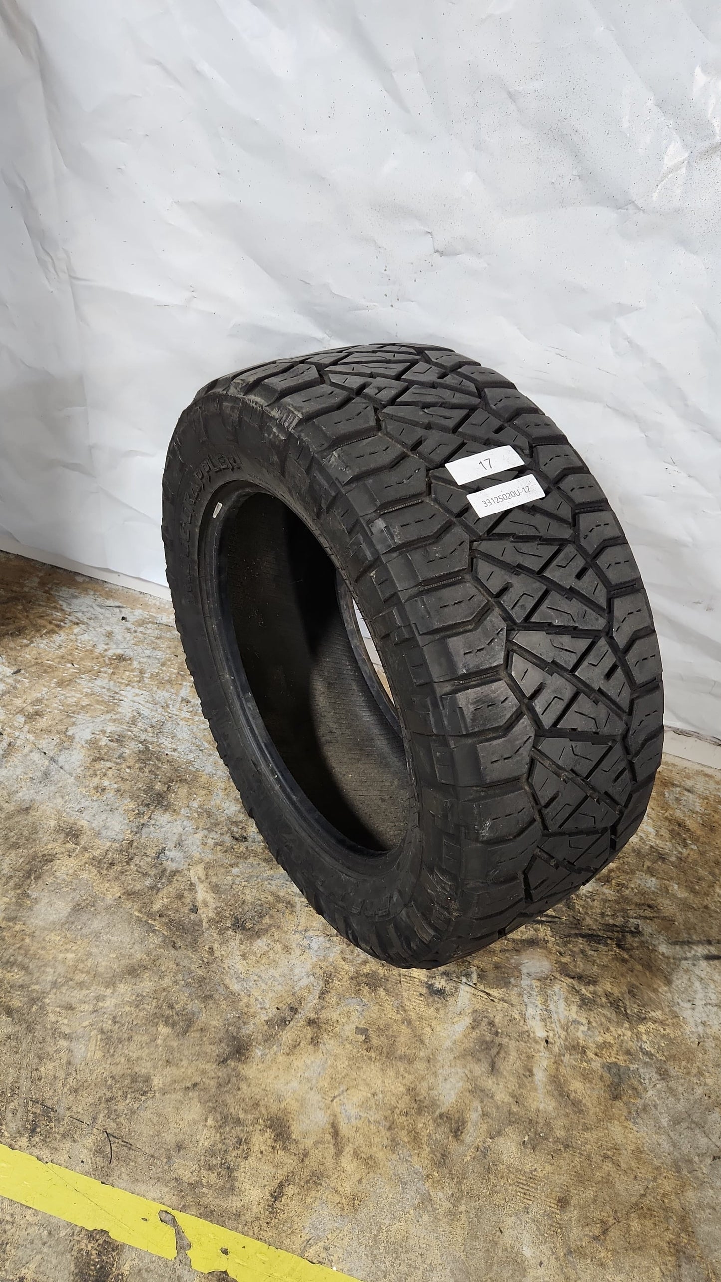 Used Tire - 33X12.50R20 Nitto Ridge Grappler 9/32
