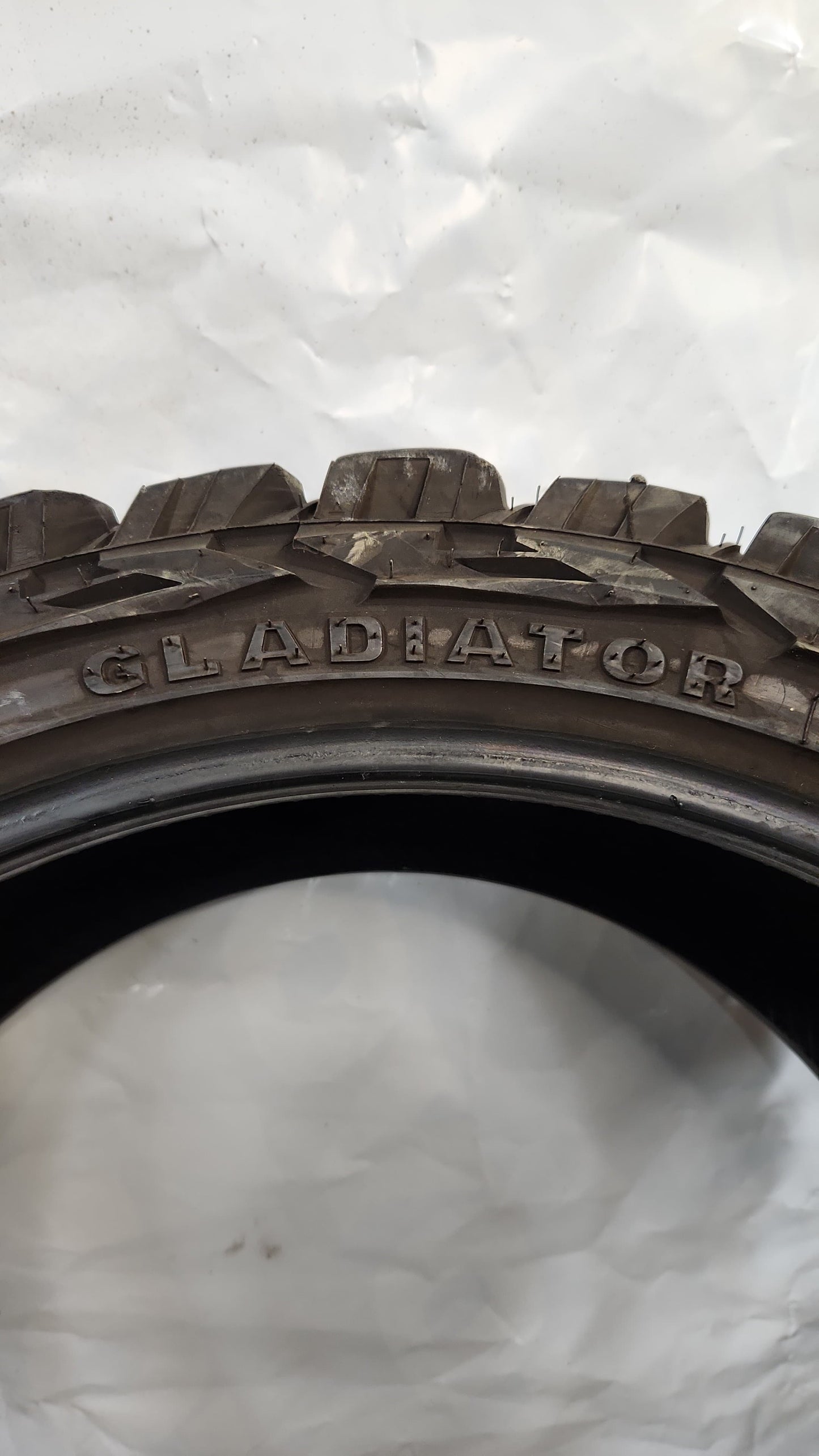 Used Tire - 35X12.50R24 Gladiator X Comp M/T 7/32