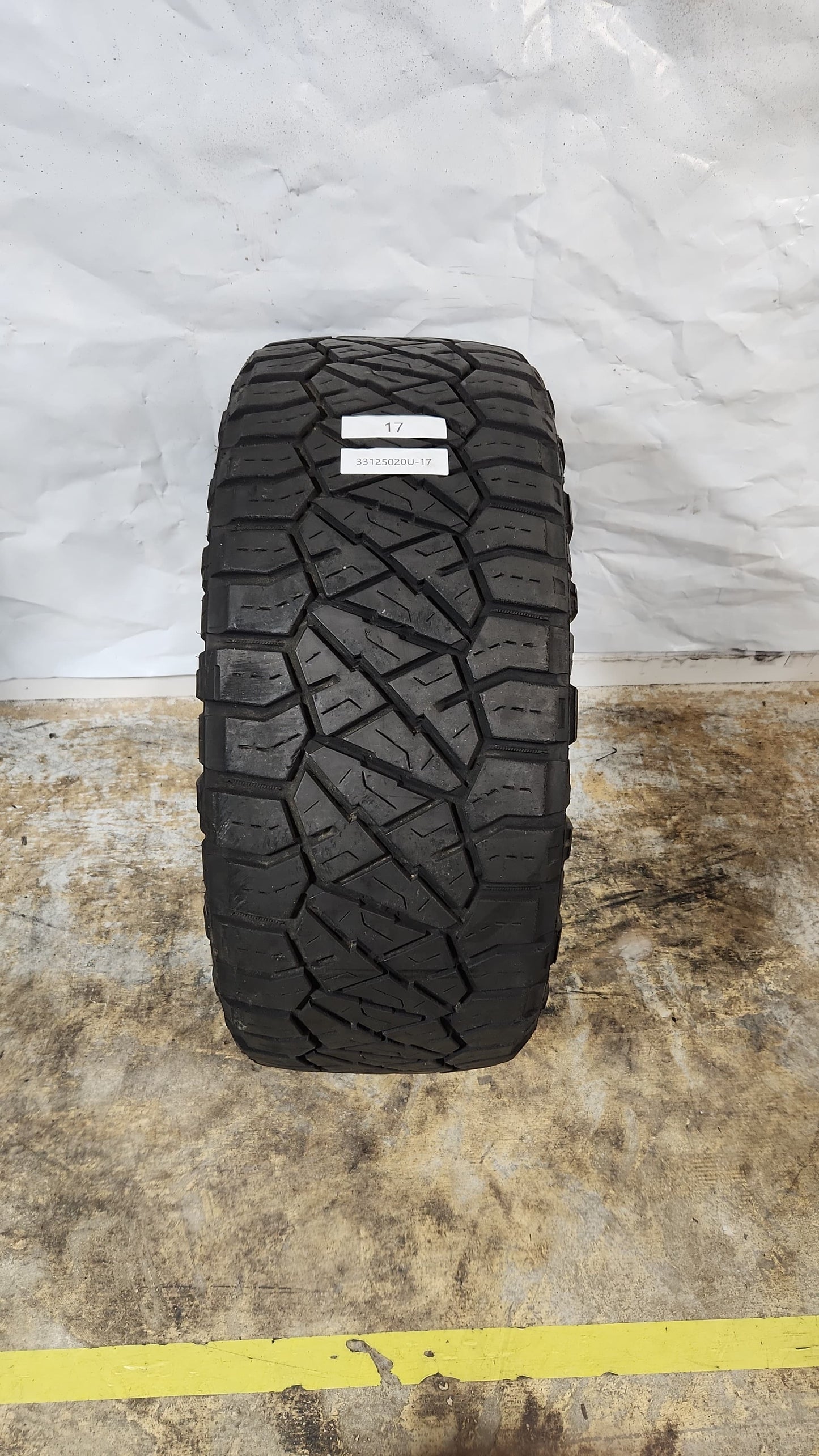 Used Tire - 33X12.50R20 Nitto Ridge Grappler 9/32