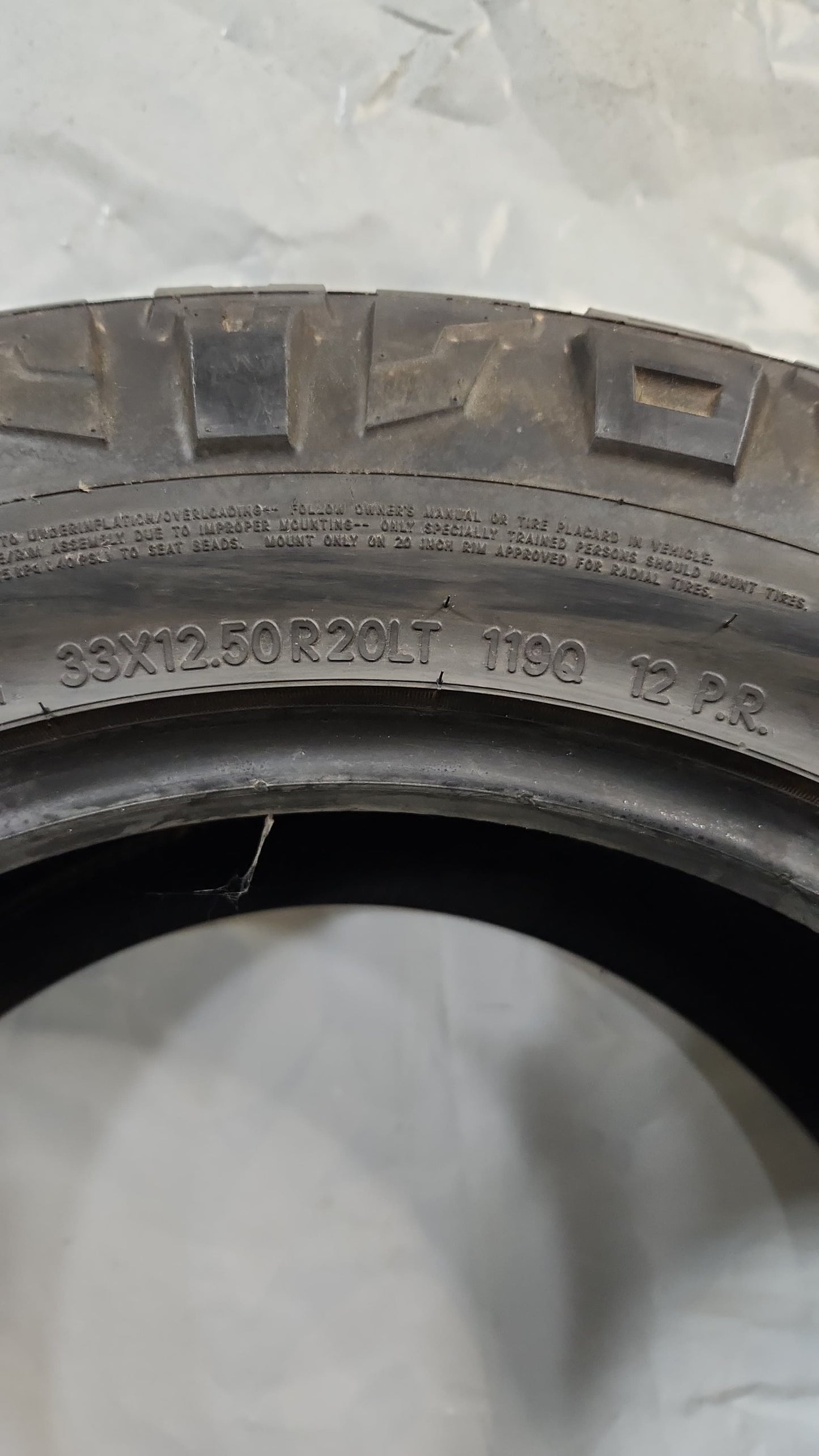 Used Tire - 33X12.50R20 Nitto Ridge Grappler 9/32
