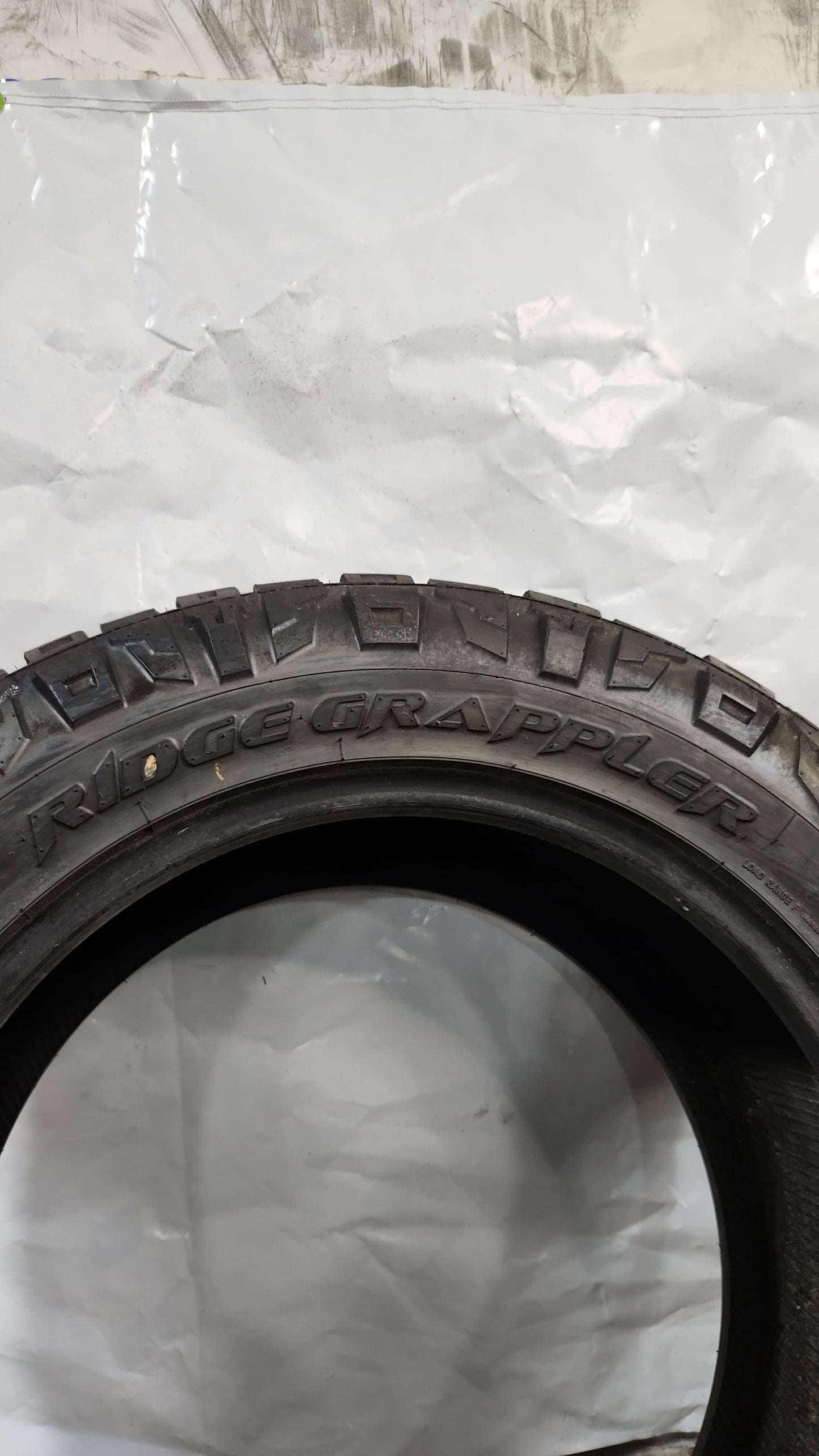 Used Tire - 33X12.50R20 Nitto Ridge Grappler 9/32