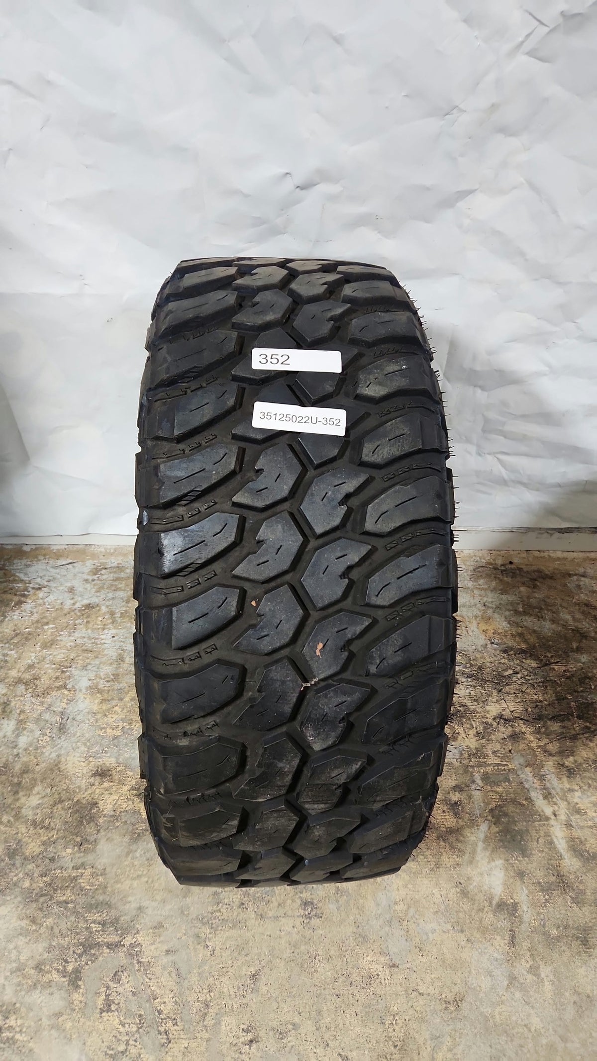 Used Tire - 35X12.50R22 Suretrac Wide Climber M/T 11/32