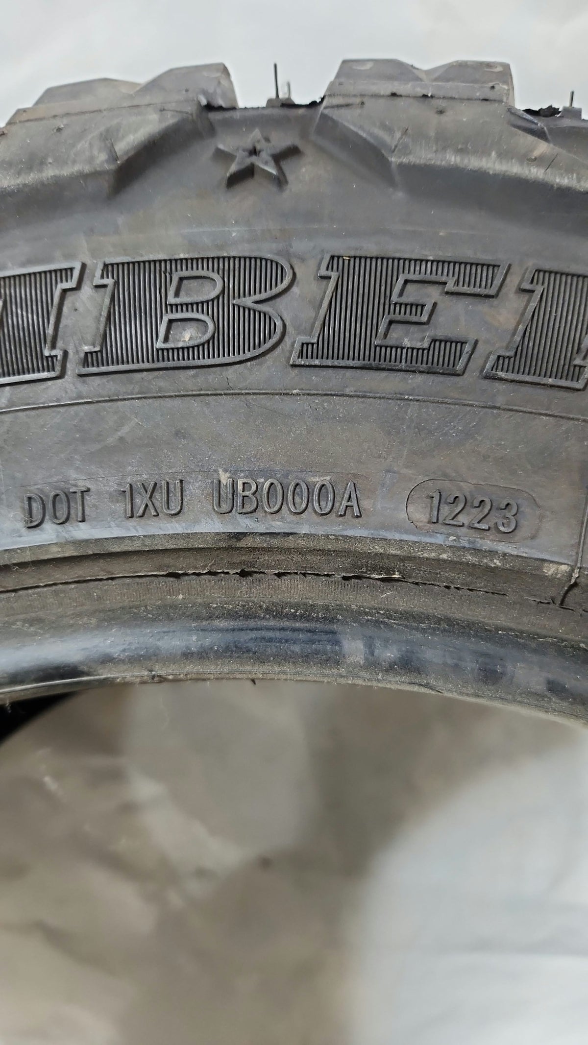 Used Tire - 35X12.50R22 Suretrac Wide Climber M/T 11/32
