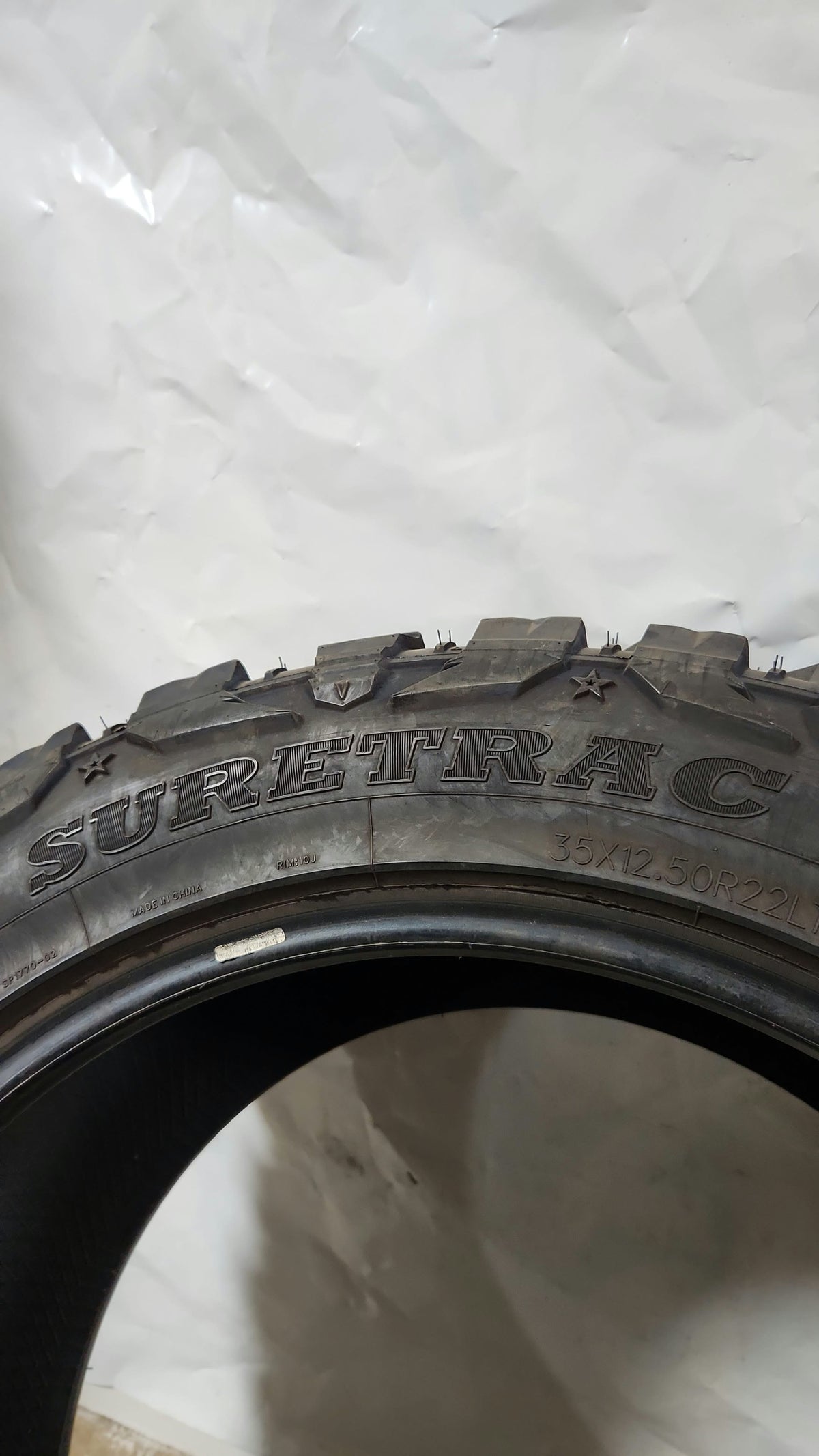 Used Tire - 35X12.50R22 Suretrac Wide Climber M/T 11/32