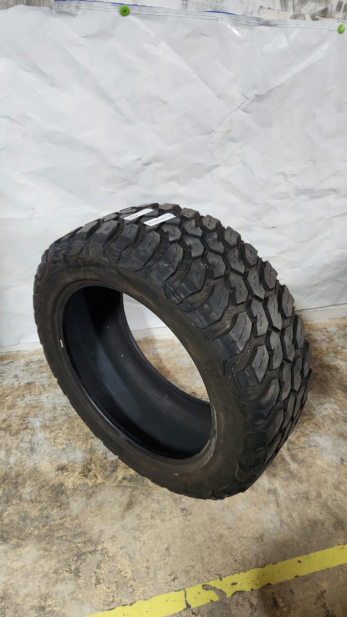 Used Tire - 35X12.50R22 Suretrac Wide Climber M/T 11/32